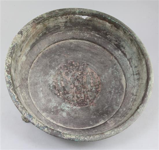 A Chinese archaic bronze tripod water basin, Pan, Warring States period, 4th/2nd century B.C., 39cm diameter, holes beneath rim